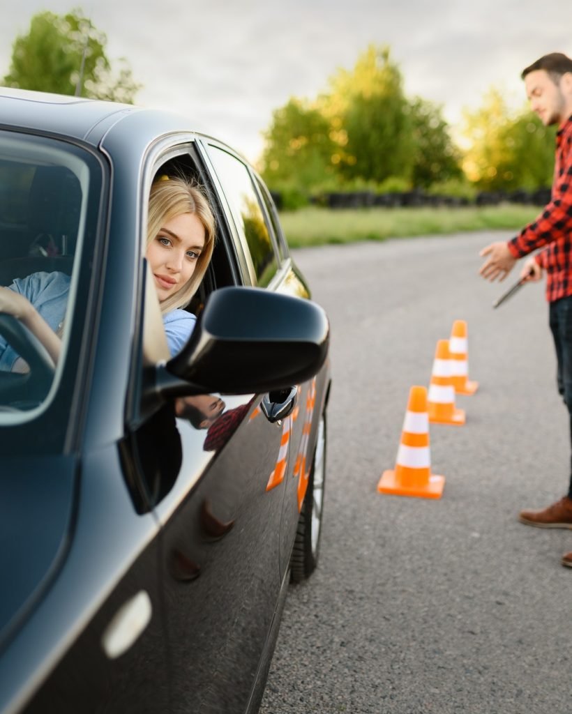 male-instructor-happy-with-driving-of-his-student.jpg